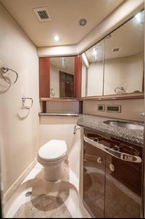 Slide: The Image of Luxurious bathroom in 2008 Sea Ray 58 Sedan Bridge yacht with modern fixtures and elegant design. - 49