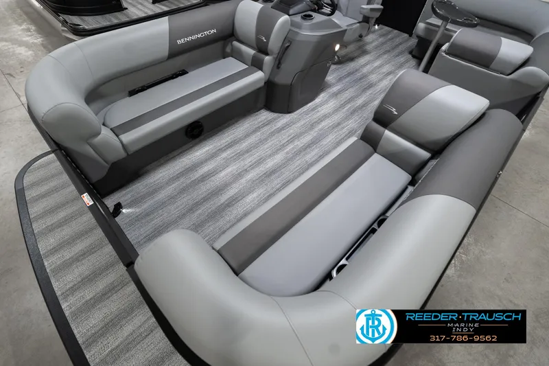 Slide: The Image of 2025 Bennington 21 SLJ pontoon boat interior with gray seating and striped flooring. - 13