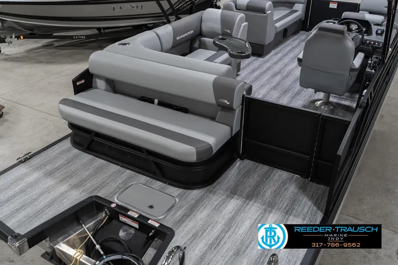 Slide: The Image of 2025 Bennington 21 SLJ pontoon boat interior with gray seating and modern design. - 16