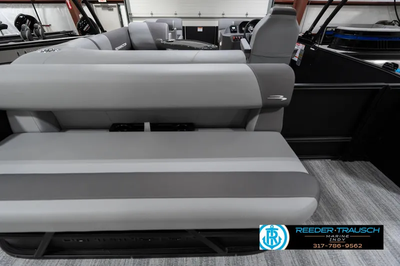 Slide: The Image of 2025 Bennington 21 SLJ pontoon boat interior with gray seating and modern design. - 20