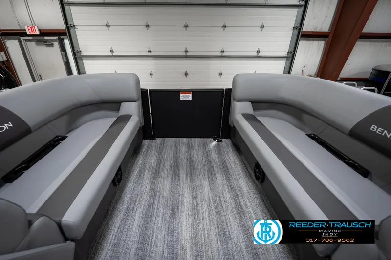 Slide: The Image of 2025 Bennington 21 SLJ boat interior with gray seating and carpet flooring. - 22