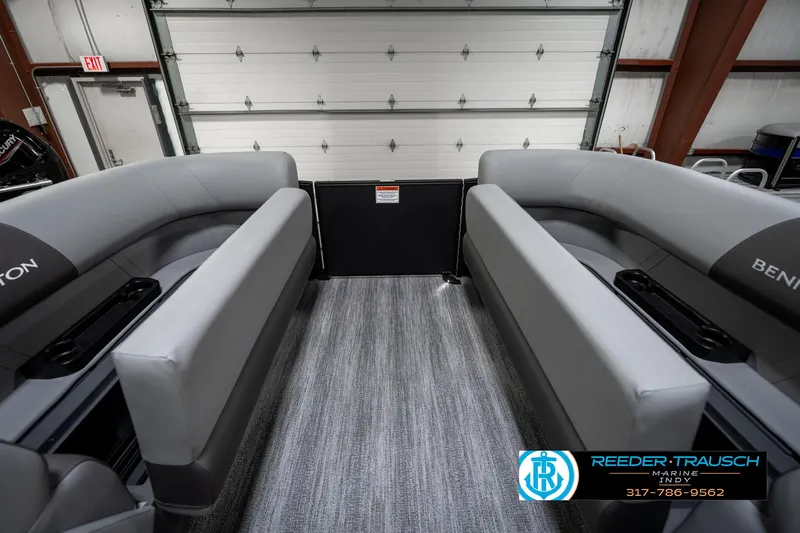 Slide: The Image of 2025 Bennington 21 SLJ boat interior with gray seating and carpeted flooring. - 23