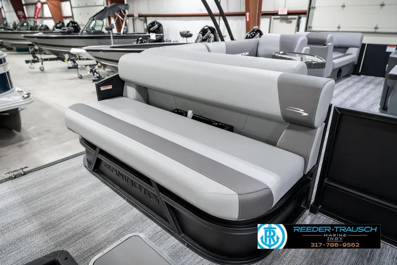 Slide: The Image of 2025 Bennington 21 SLJ pontoon boat interior with gray seating in showroom. - 31