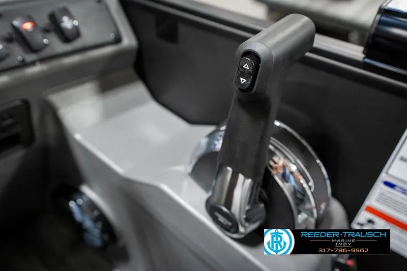 Slide: The Image of Throttle control of 2025 Bennington 21 SLJ boat, featuring sleek design and ergonomic handle. - 40