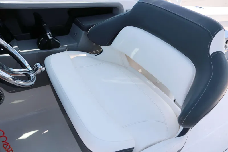 Slide: The Image of 2023 Robalo R317 boat seat with sleek white and gray design. - 15