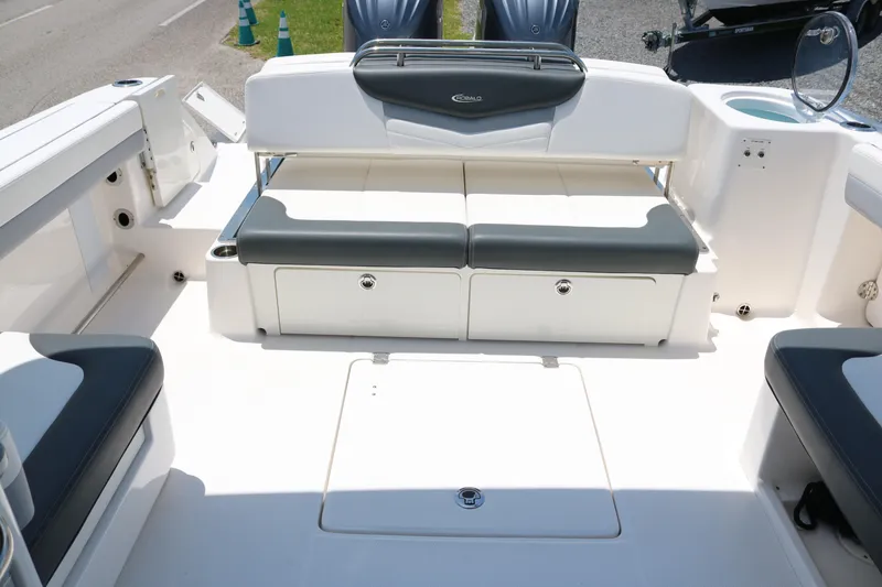 Slide: The Image of 2023 Robalo R317 boat interior with seating and storage compartments. - 21