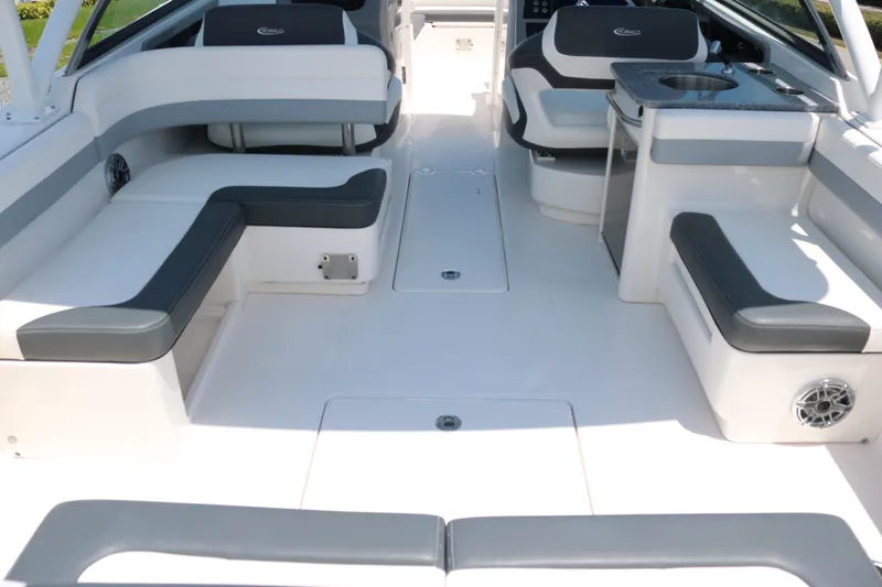 Slide: The Image of 2023 Robalo R317 boat interior with spacious seating and modern design. - 22