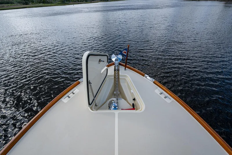 Slide: The Image of Hinckley Picnic Boat 37 MKIII 2017 bow view on calm water. - 30