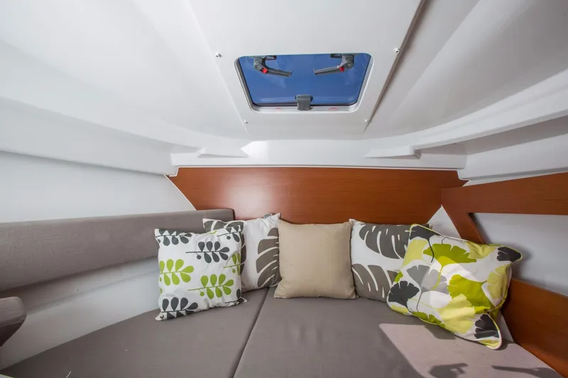 Slide: The Image of Interior of 2025 Jeanneau NC 795 Series 2 boat with dining area and helm. - 15