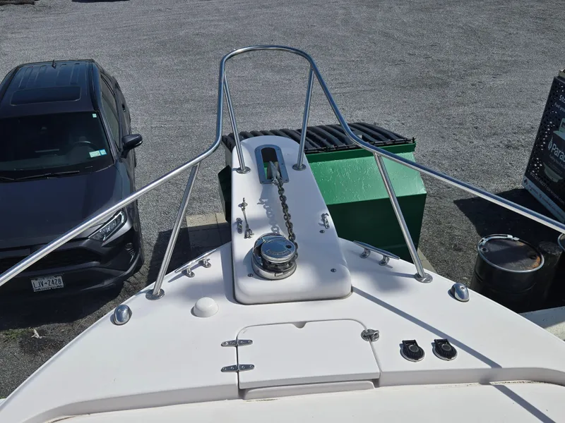 Slide: The Image of Bow view of 2005 Grady-White 330 Express boat with anchor chain and railing. - 3