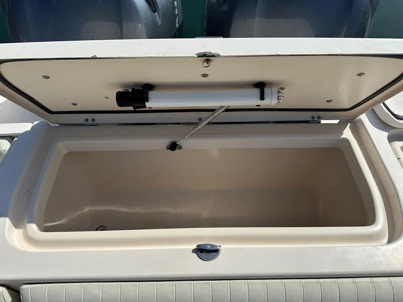 Slide: The Image of Open storage compartment on a 2007 Grady-White 273 CHASE boat. - 17