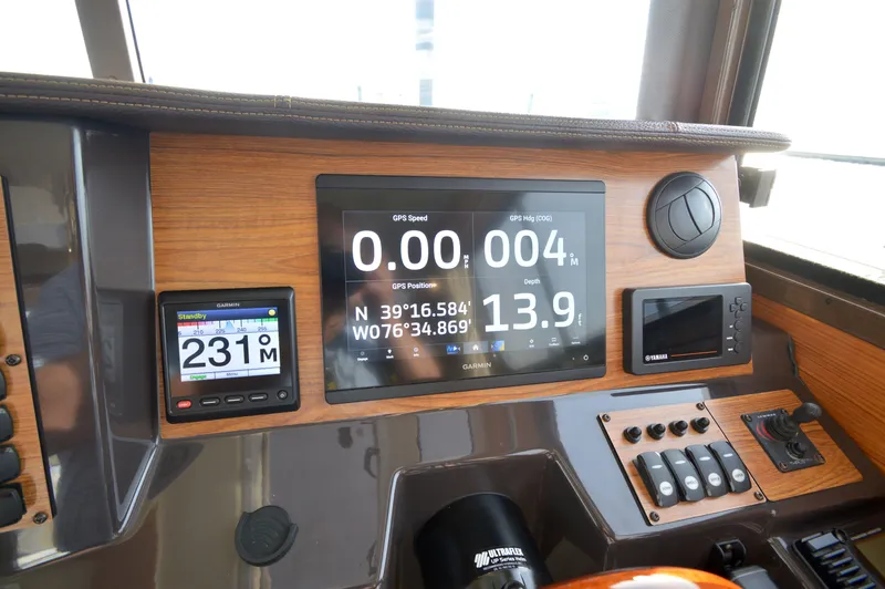 Slide: The Image of Dashboard of 2020 Ranger Tugs R-27 with Garmin and Yamaha displays. - 35