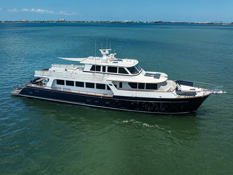 The Image of Luxury 2011 Marlow 97 Explorer yacht cruising on calm blue waters. - 0