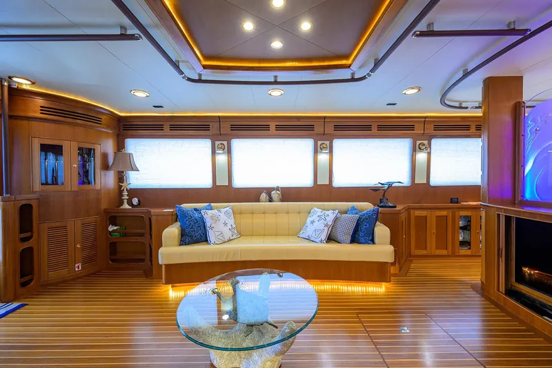 Slide: The Image of Luxurious interior of 2011 Marlow 97 Explorer yacht with elegant wood finishes and modern lighting. - 12