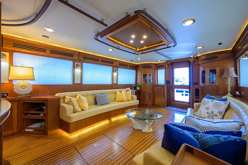 Slide: The Image of Luxurious interior of 2011 Marlow 97 Explorer yacht with elegant seating and ambient lighting. - 13
