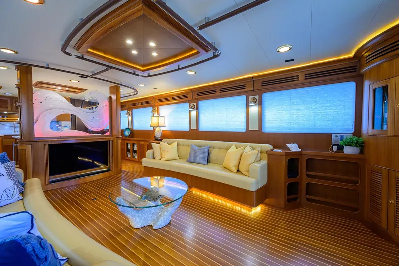 Slide: The Image of Luxurious interior of 2011 Marlow 97 Explorer yacht with elegant wood finishes and modern lighting. - 14