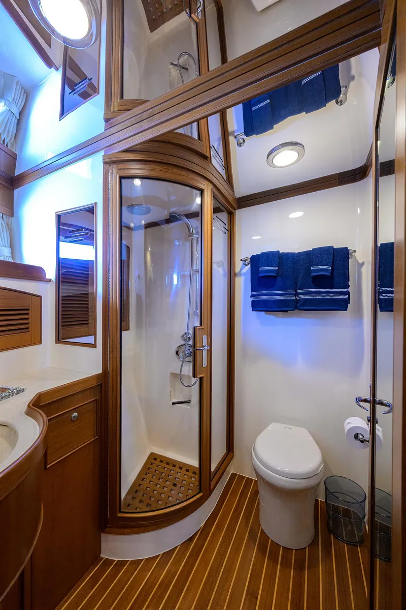 Slide: The Image of Luxurious Marlow 97 Explorer 2011 yacht bathroom with wood accents and modern fixtures. - 38