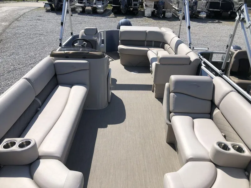 Slide: The Image of 2018 Bennington 22SLX pontoon boat with spacious seating and modern design. - 3