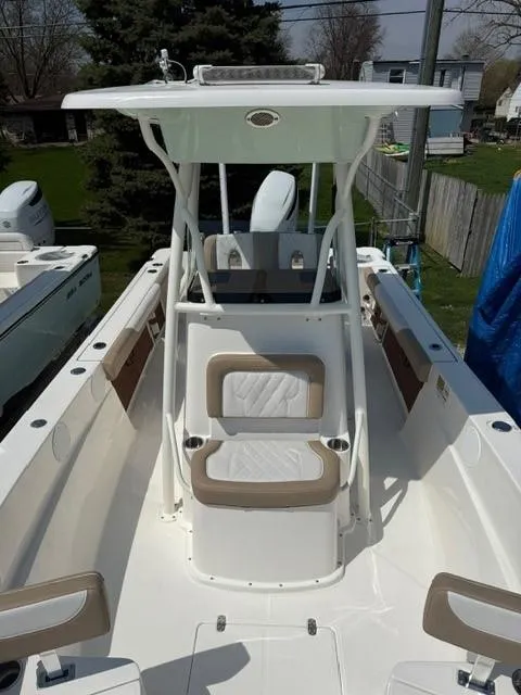 Slide: The Image of 2025 Sea Born LX24 Center Console boat with sleek design and spacious seating. - 19