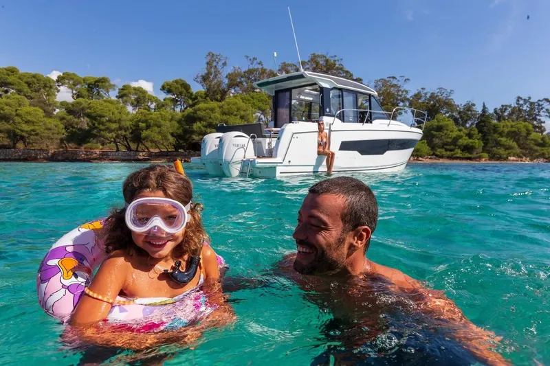 Slide: The Image of Family enjoying water near 2025 Jeanneau NC 895 Series 2 boat. - 52
