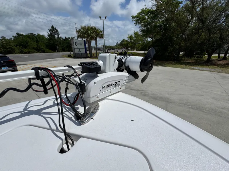 Slide: The Image of 2023 Sportsman Open 212 Center Console with Minn Kota trolling motor. - 25