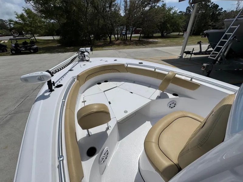 Slide: The Image of 2023 Sportsman Open 212 Center Console boat with tan seating and spacious deck. - 27