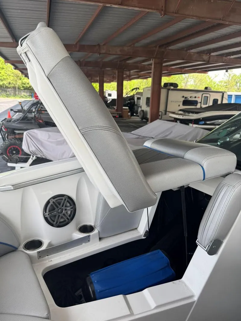 Slide: The Image of 2015 MasterCraft X23 boat interior with adjustable seating and speaker system. - 34