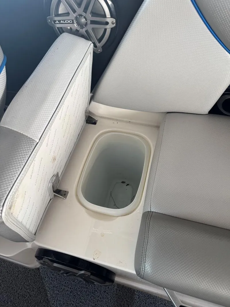 Slide: The Image of 2015 MasterCraft X23 boat seat with built-in storage compartment. - 39