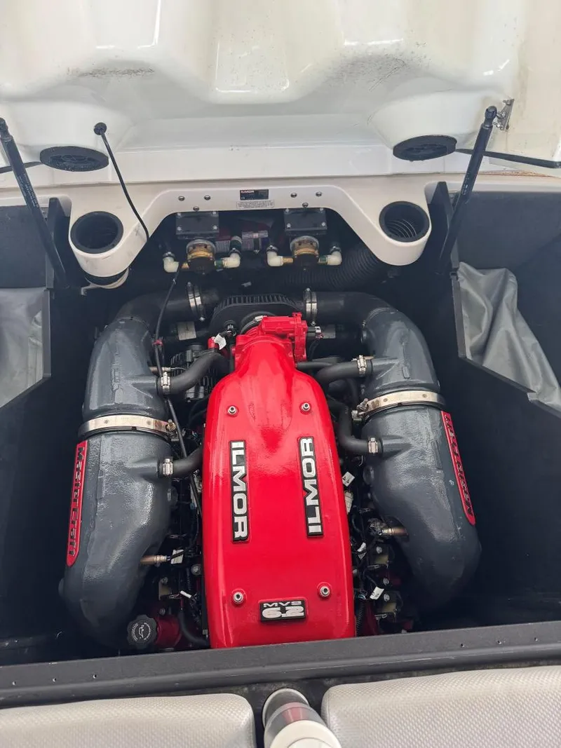 Slide: The Image of 2015 MasterCraft X23 engine with red Ilmor branding, showcasing powerful performance. - 42