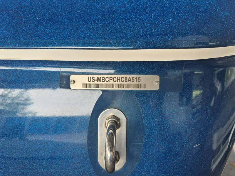 Slide: The Image of 2015 MasterCraft X23 boat hull with identification number plate. - 6