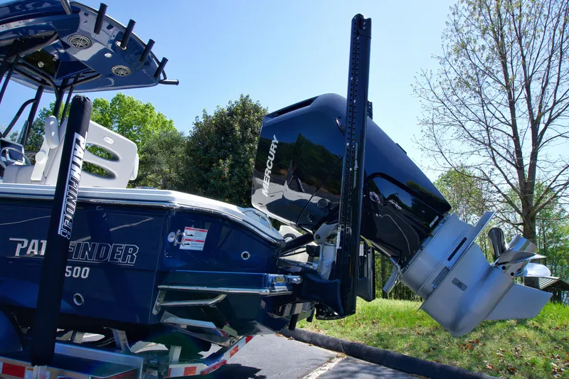 Slide: The Image of 2025 Pathfinder 2500 Hybrid boat with powerful outboard motor on a trailer. - 5