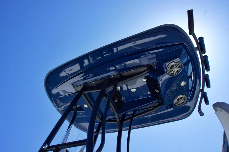 Slide: The Image of 2025 Pathfinder 2500 Hybrid boat's T-top against clear blue sky. - 9