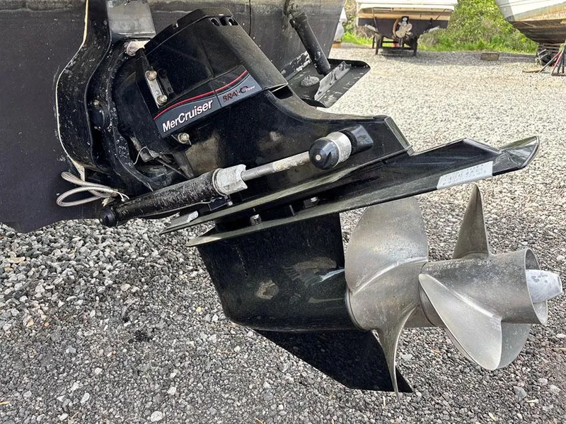 Slide: The Image of MerCruiser outdrive on 2007 Sea Ray 260 Sundancer, gravel background. - 20