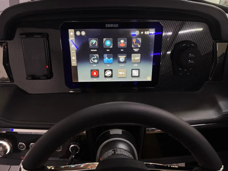Slide: The Image of Dashboard of 2025 Chaparral 2870 SSX with touchscreen navigation system. - 16
