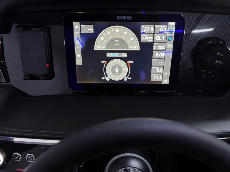 Slide: The Image of Dashboard of 2025 Chaparral 2870 SSX boat with digital display and controls. - 18