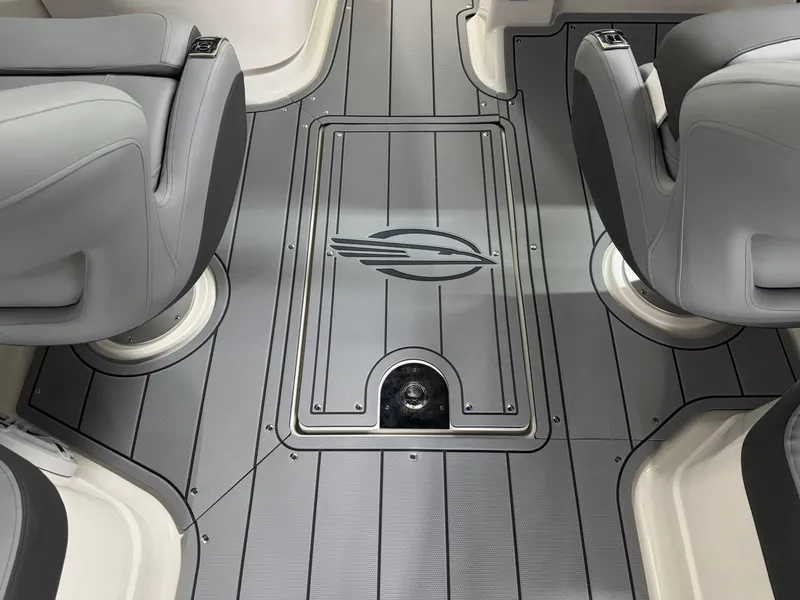Slide: The Image of Interior of 2025 Chaparral 2870 SSX boat with sleek gray seating and flooring. - 36