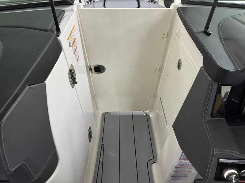 Slide: The Image of 2025 Chaparral 2870 SSX boat interior with sleek seating and modern design. - 38