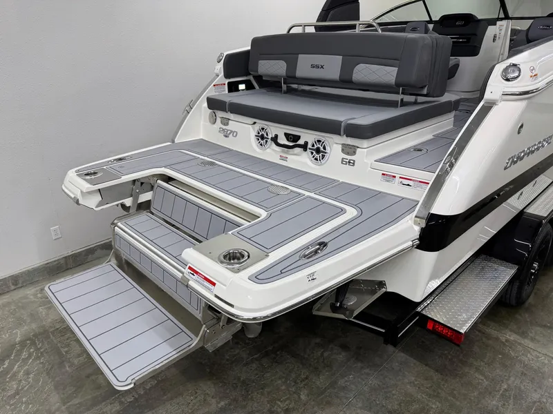 Slide: The Image of 2025 Chaparral 2870 SSX boat with extended swim platform and seating area. - 5