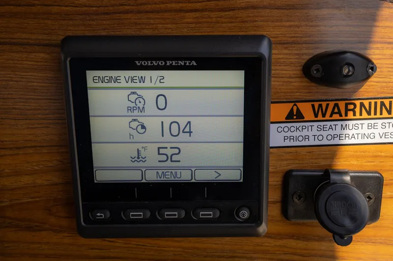 Slide: The Image of Volvo Penta engine display on 2023 Ranger Tugs R-31 S boat dashboard. - 24