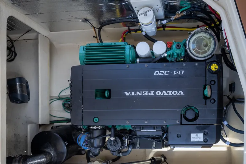 Slide: The Image of Engine compartment of 2023 Ranger Tugs R-31 S with Volvo Penta D4-320 engine. - 32