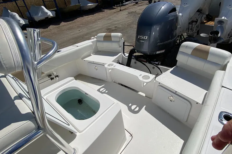 Slide: The Image of Edgewater 188CC 2020 boat interior with seating and outboard motor. - 15