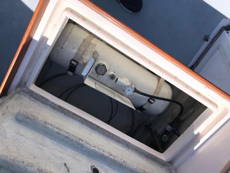 Slide: The Image of Compartment view of a 1976 Grand Banks 42 Classic boat, showing internal equipment. - 12