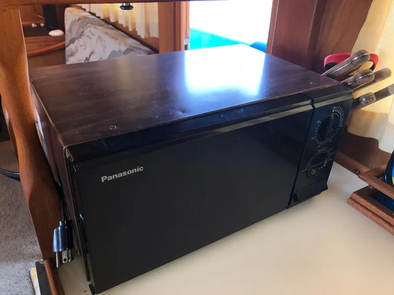 Slide: The Image of Panasonic microwave on a Grand Banks 42 Classic yacht, 1976 model interior. - 33