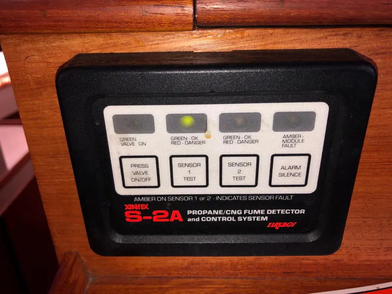 Slide: The Image of Control panel of Xintex S-2A propane/CNG fume detector on 1976 Grand Banks 42 Classic. - 43