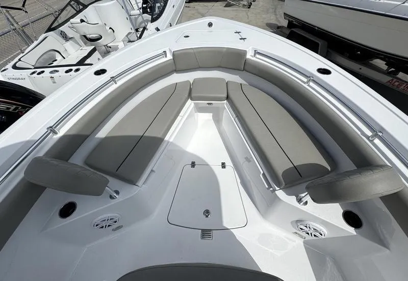 Slide: The Image of 2025 Sportsman Open 212 boat with spacious seating and modern design. - 12