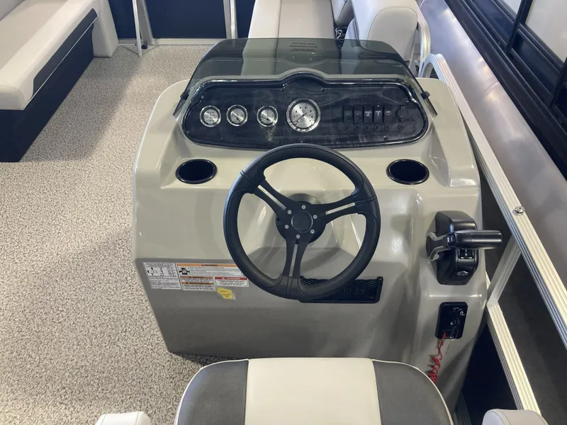 Slide: The Image of 2025 Montego Bay 8518 Cruise boat dashboard and steering wheel. - 17