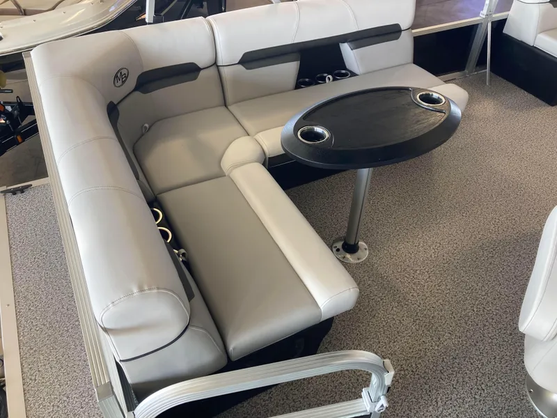 Slide: The Image of Montego Bay 8518 Cruise pontoon boat, 2025 model, displayed in showroom. - 3