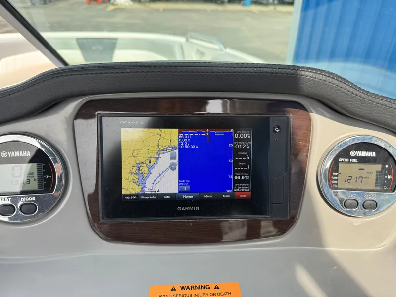 Slide: The Image of Dashboard of 2019 Chaparral 21 H2O Sport OB with Garmin navigation system. - 12