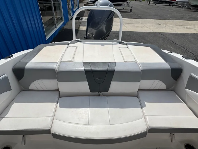 Slide: The Image of 2019 Chaparral 21 H2O Sport OB boat with spacious rear seating and sleek design. - 17