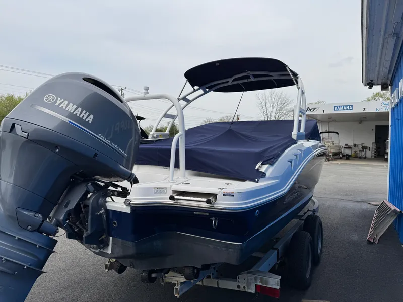 Slide: The Image of 2019 Chaparral 21 H2O Sport OB boat with Yamaha outboard motor on trailer. - 4